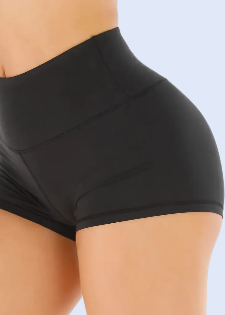 Black high-waisted shorts on a white background