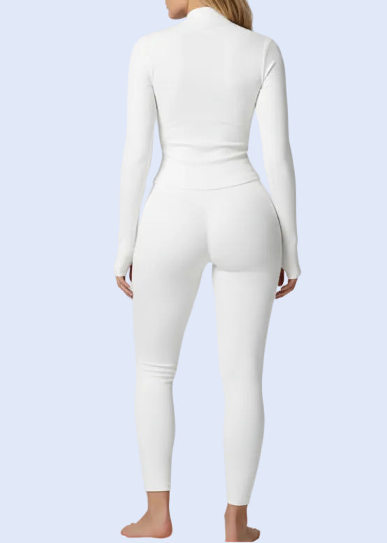 Person wearing a blue athletic outfit on a white background