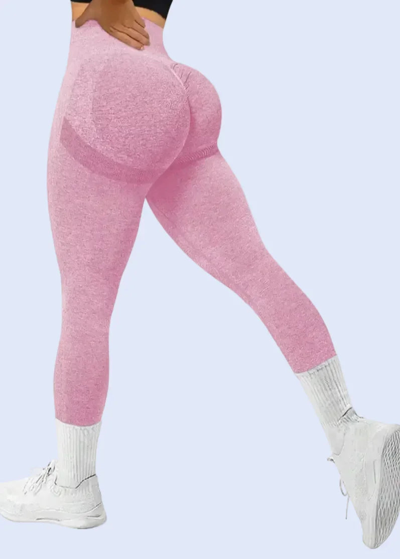 Pink leggings worn by a person on a shopping app interface.
