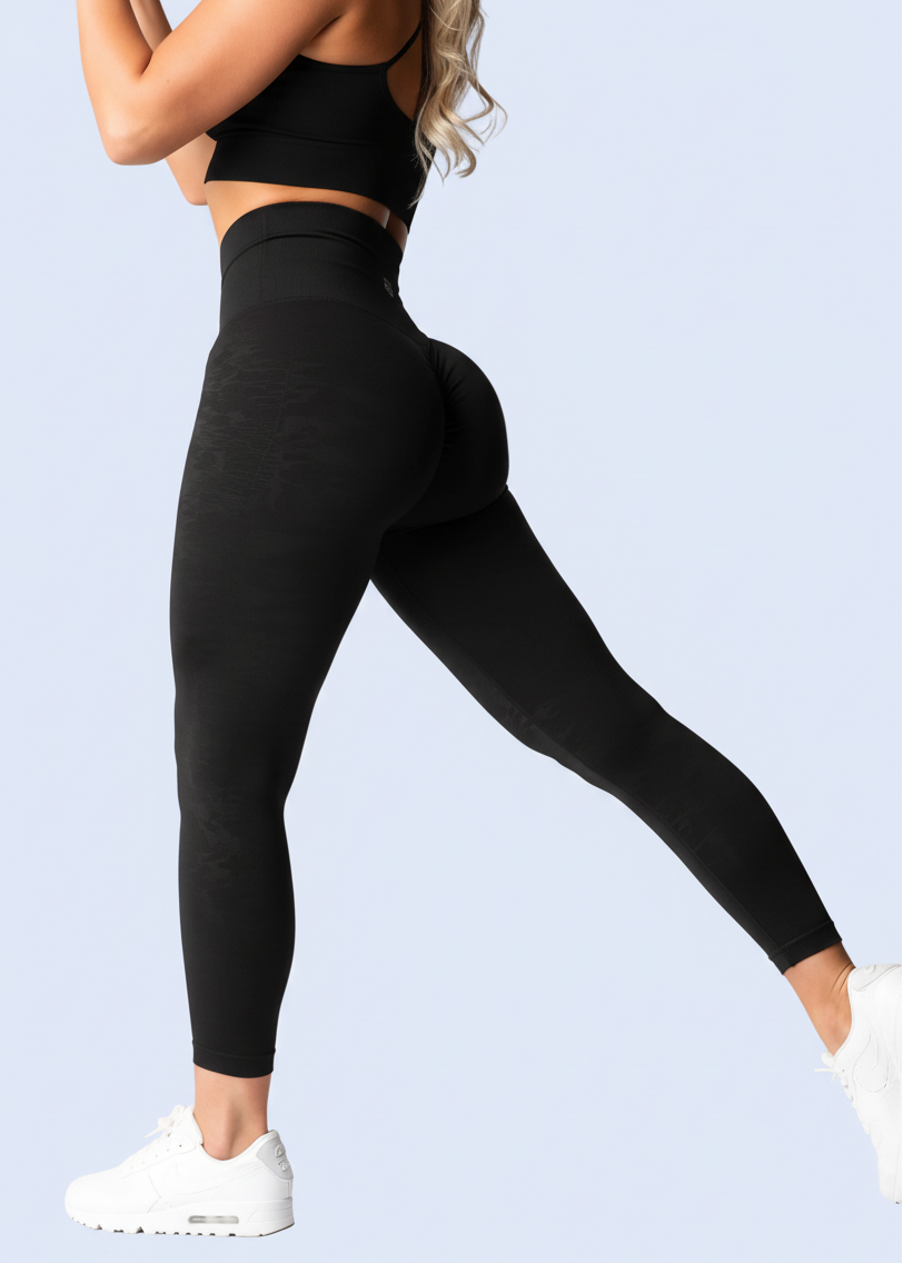 Woman wearing black athletic leggings and top on a white background with product details at the bottom.