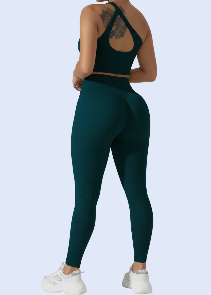 Person wearing a teal athletic outfit on a plain background