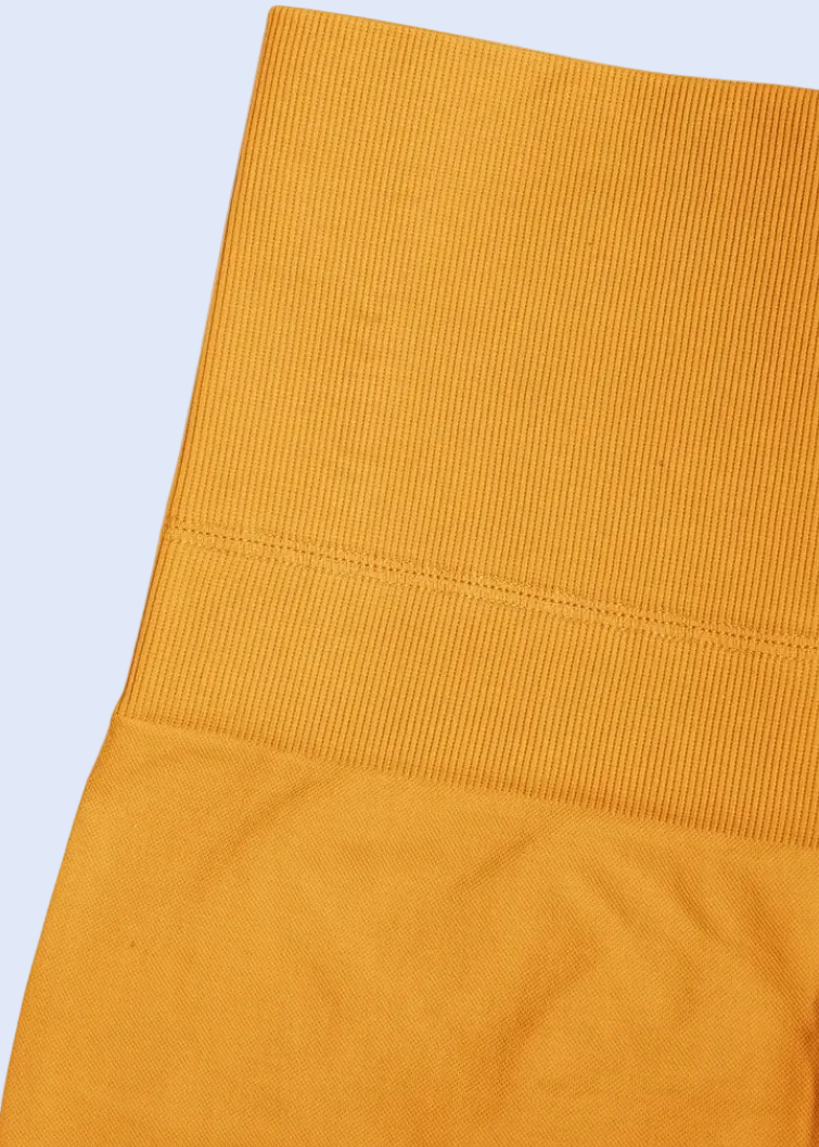 Mustard yellow fabric on a white background