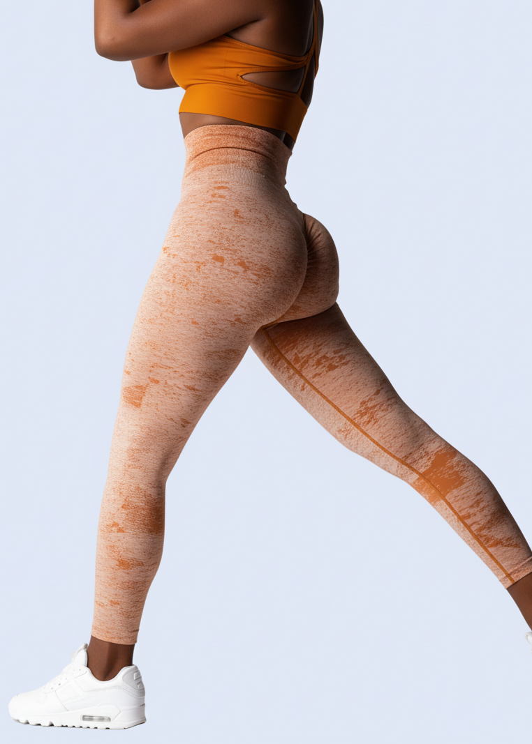 Person wearing terracotta leggings on a white background with product details.