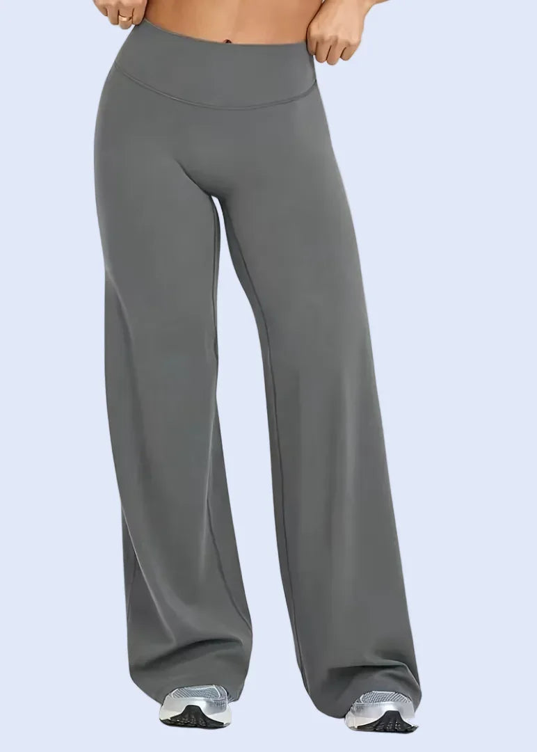 Gray wide-leg pants worn by a person on a white background
