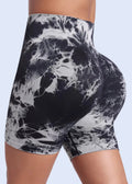 Black and white tie-dye shorts on a plain background