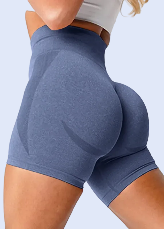 Blue athletic shorts worn by a person on a white background