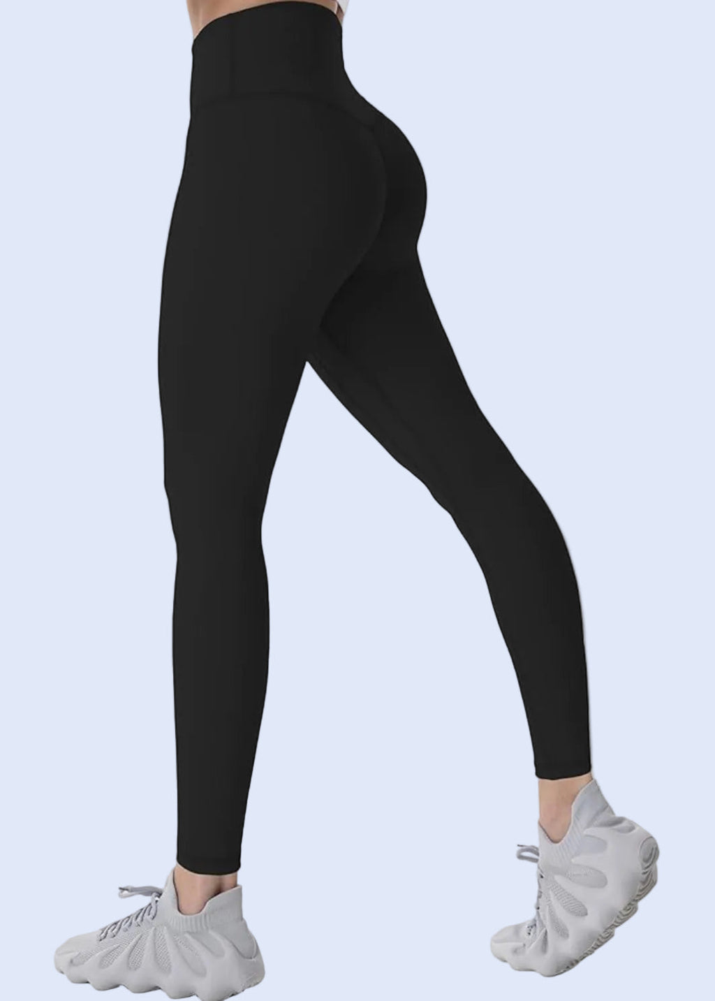 Black leggings worn by a person on a white background