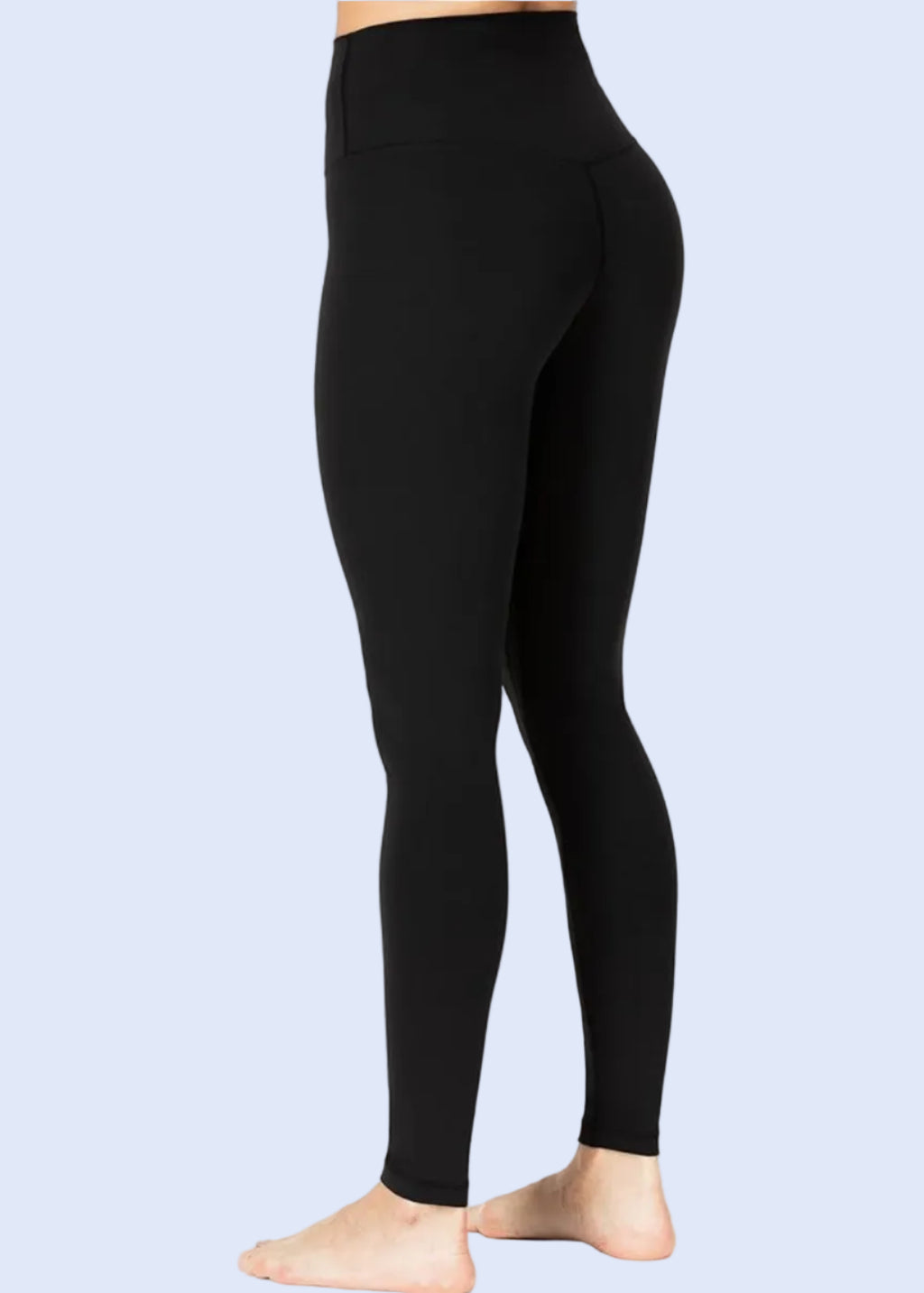 Black leggings worn by a person on a white background