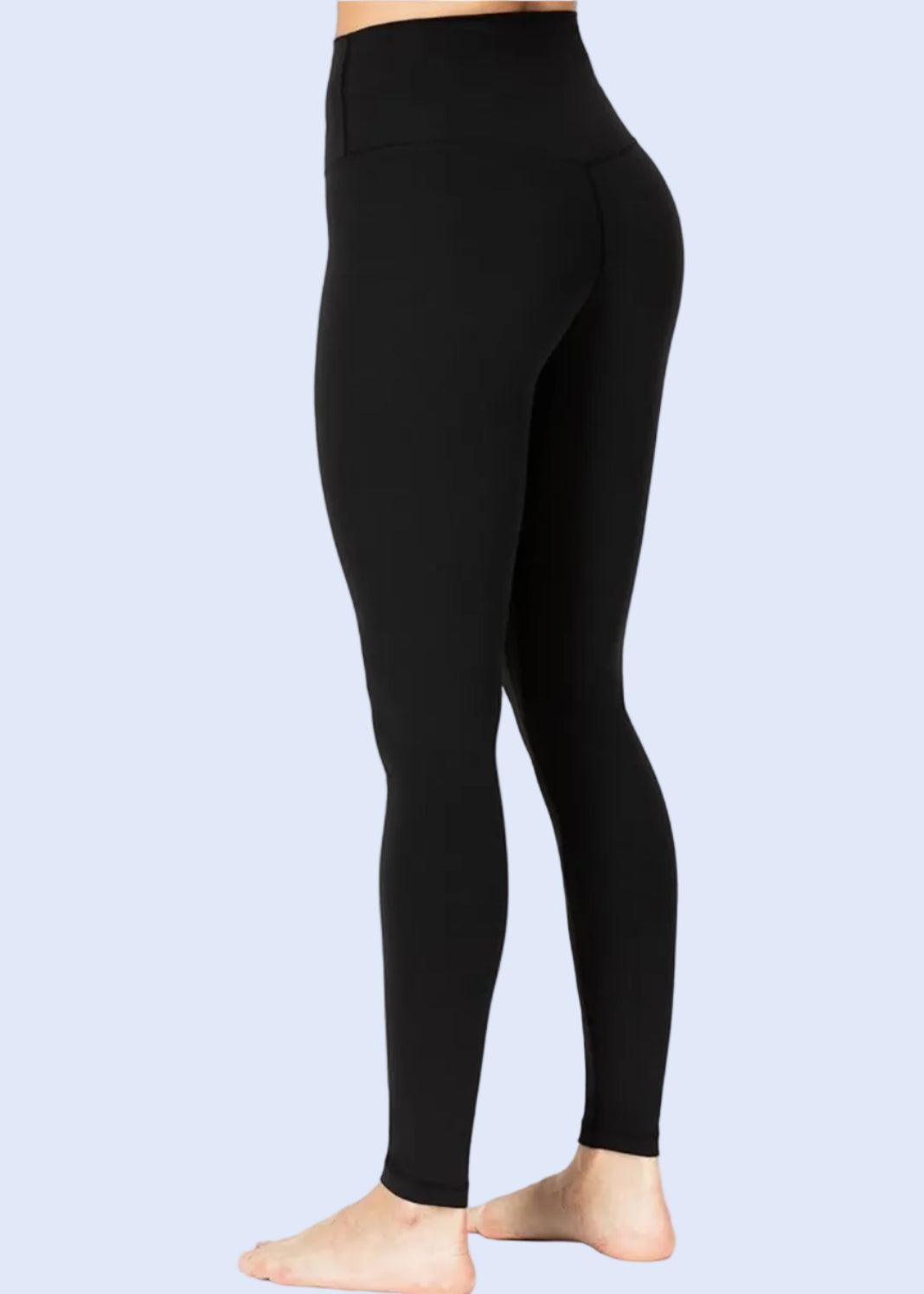 Black leggings worn by a person on a white background