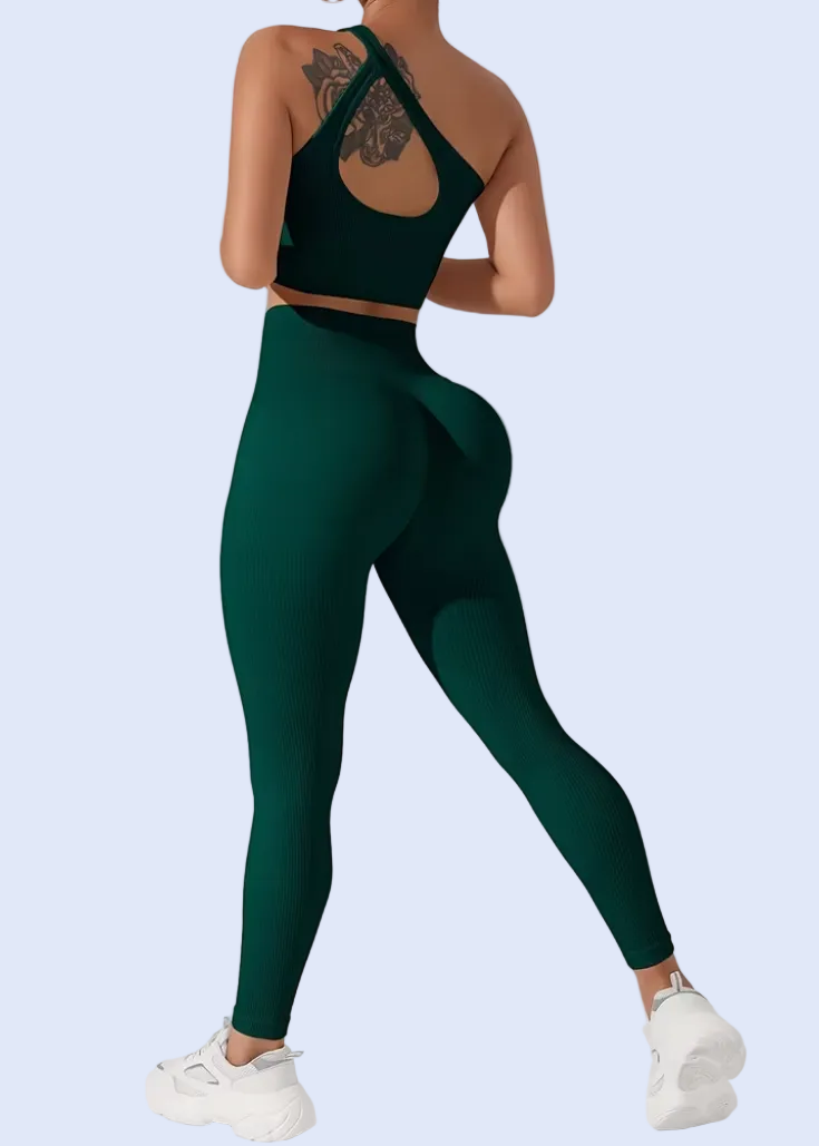 Person wearing a green athletic outfit on a white background