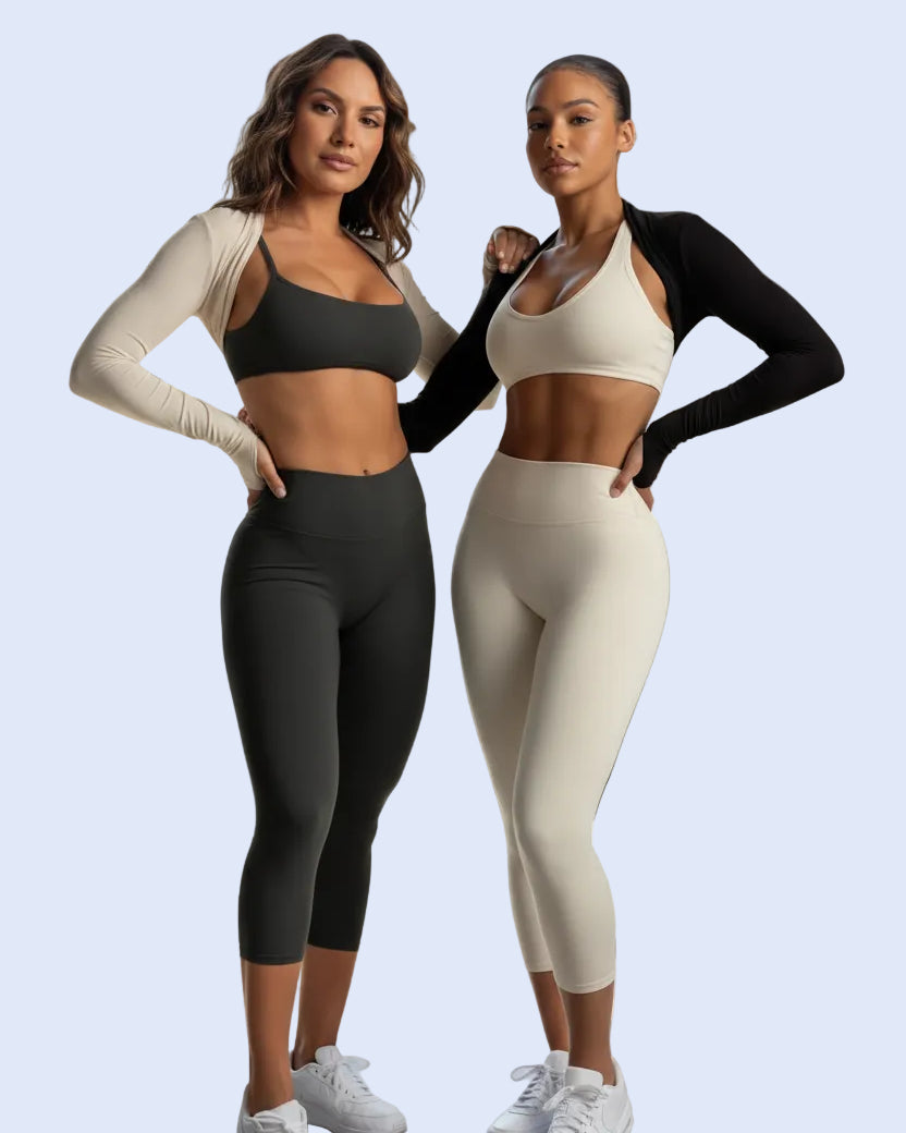 Two women wearing athletic wear on a gray background