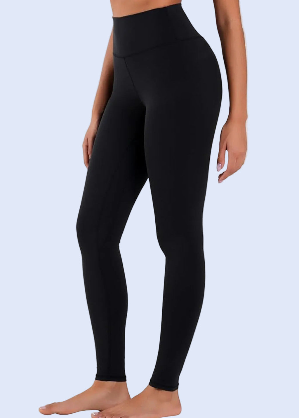 Black leggings worn by a person on a white background