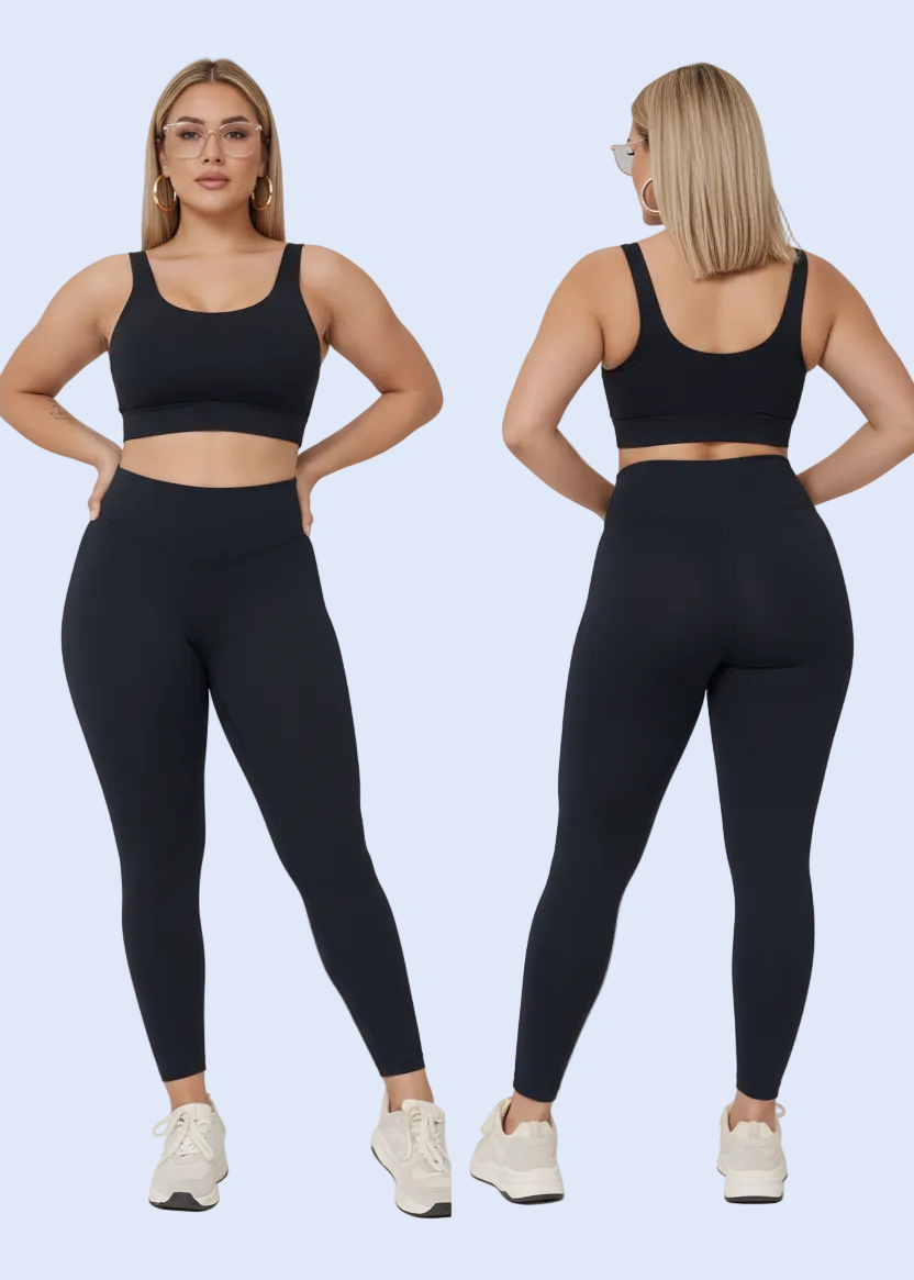 Person wearing black leggings on a white background