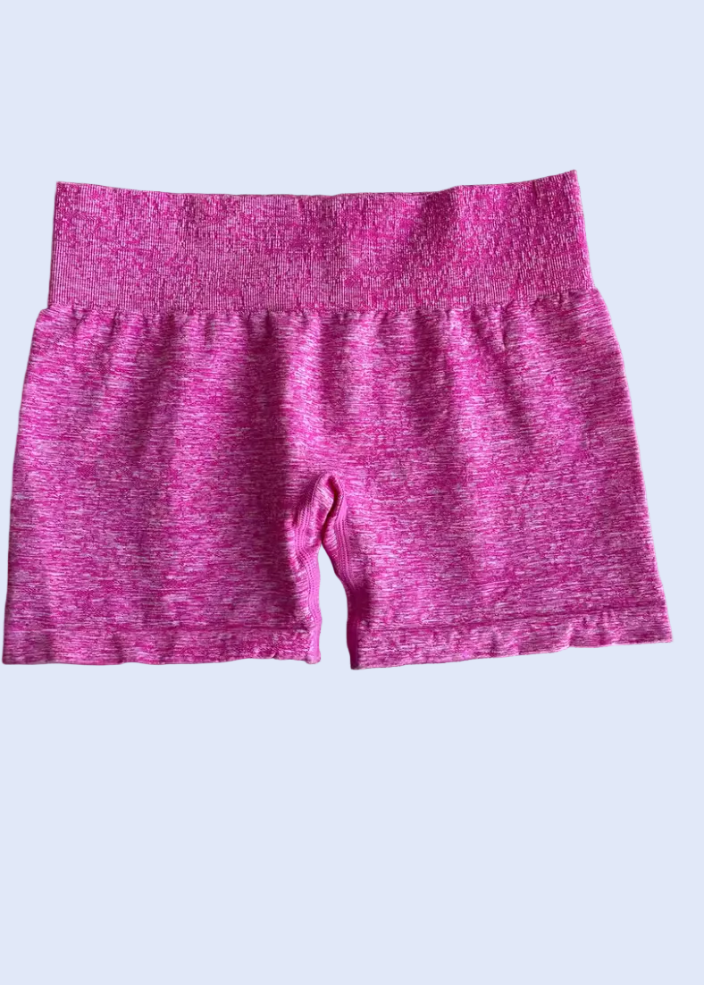 Pink shorts on a gray background with 'Add to cart' and 'Buy now' buttons below.