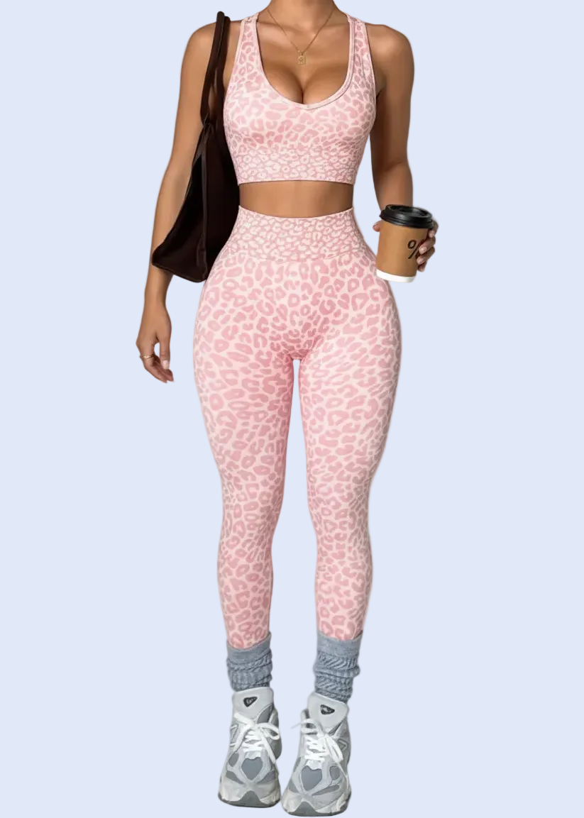 Person wearing a pink athletic outfit on a gray background