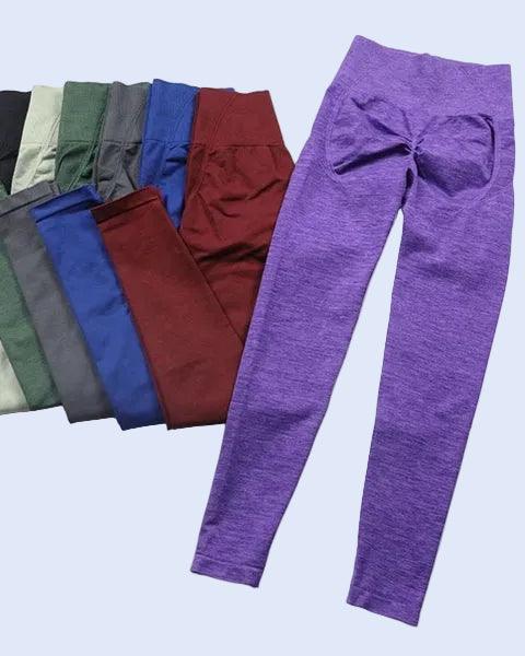 Purple leggings with a bow on a light gray background