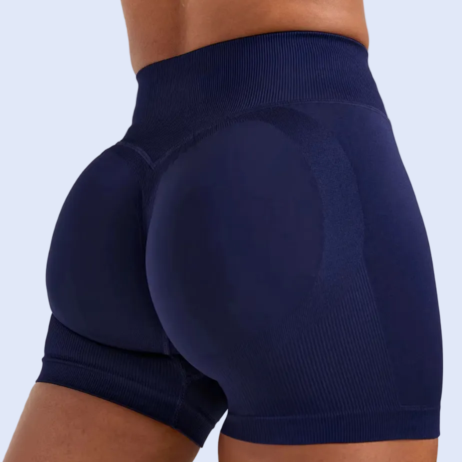 Product page for women's sports shorts showing various colors on a white background.