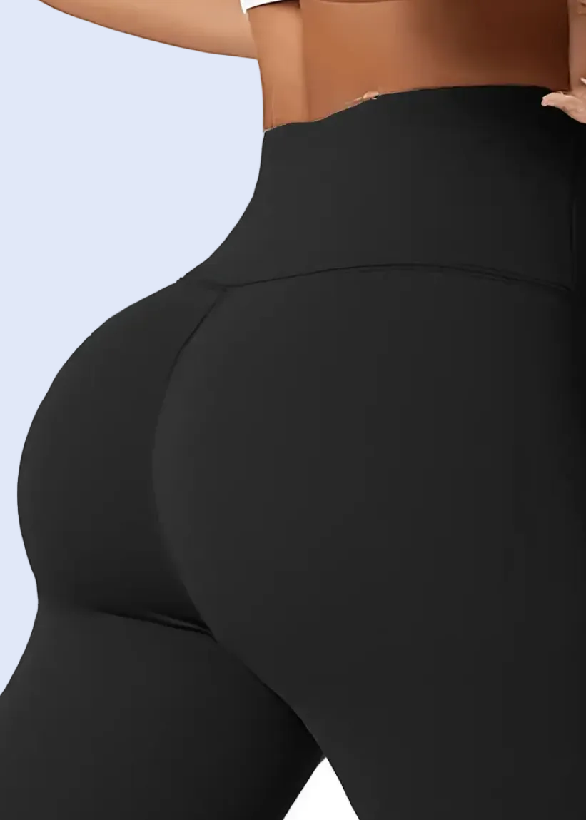 Black leggings worn by a person on a white background