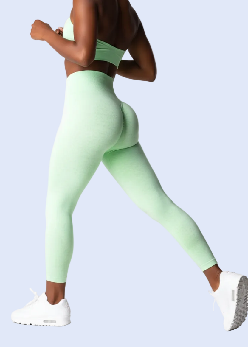 Person wearing pistachio green leggings on a white background with product details at the bottom.