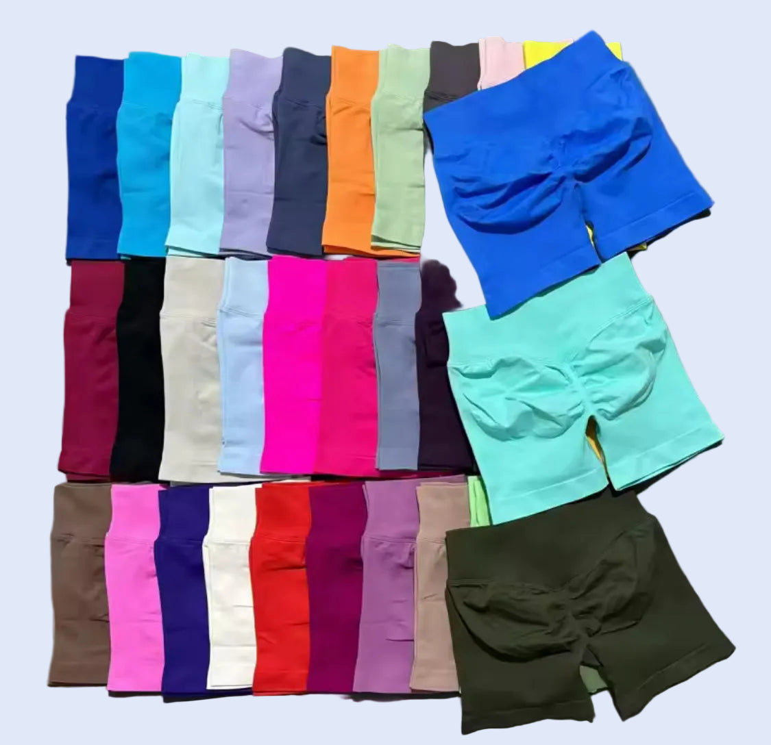 Collection of colorful boxer briefs arranged in a grid on a gray background