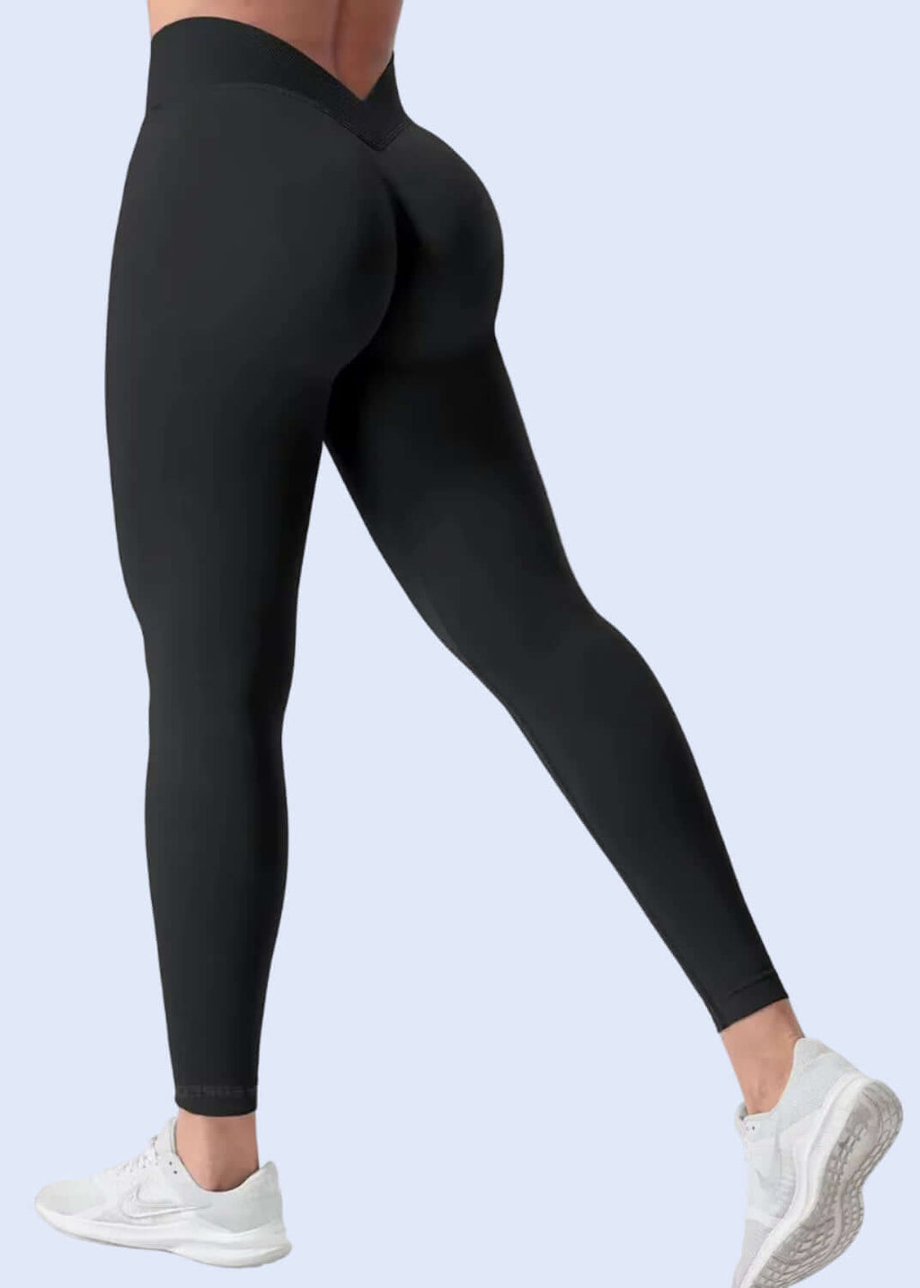 Black leggings worn by a person on a white background