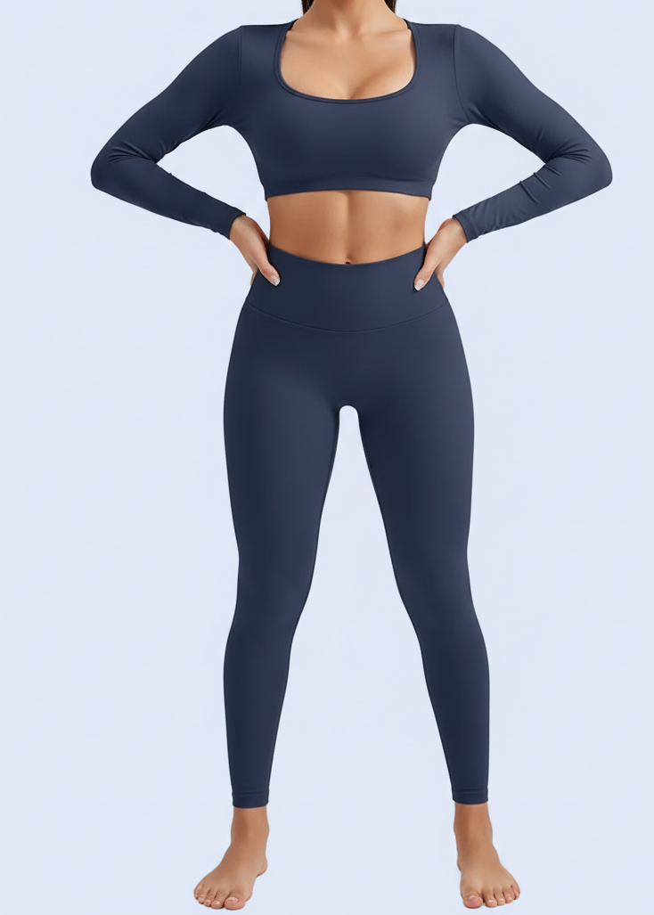 Navy blue long-sleeve top and leggings set on a white background