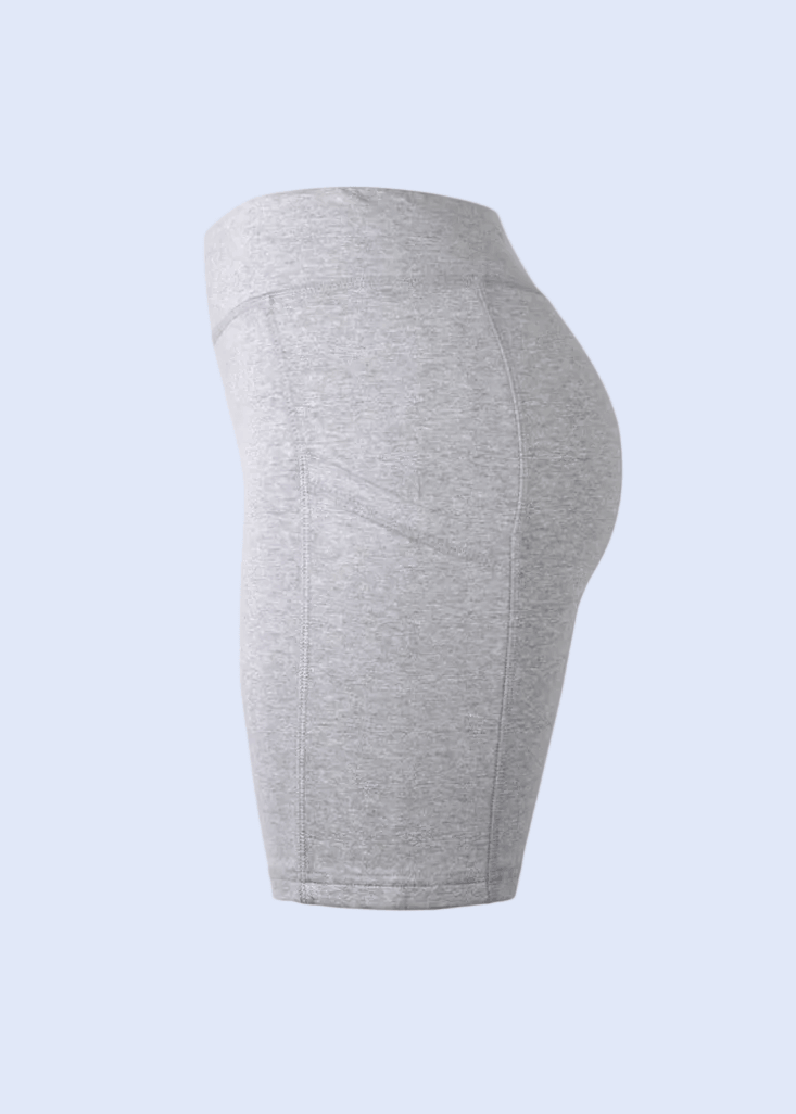 Gray leggings on a white background with a smartphone interface at the top and bottom.