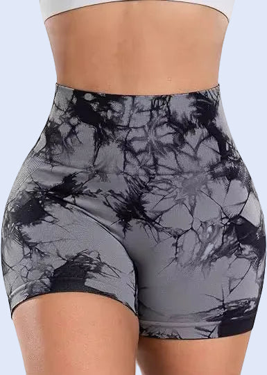 Gray tie-dye shorts worn by a person