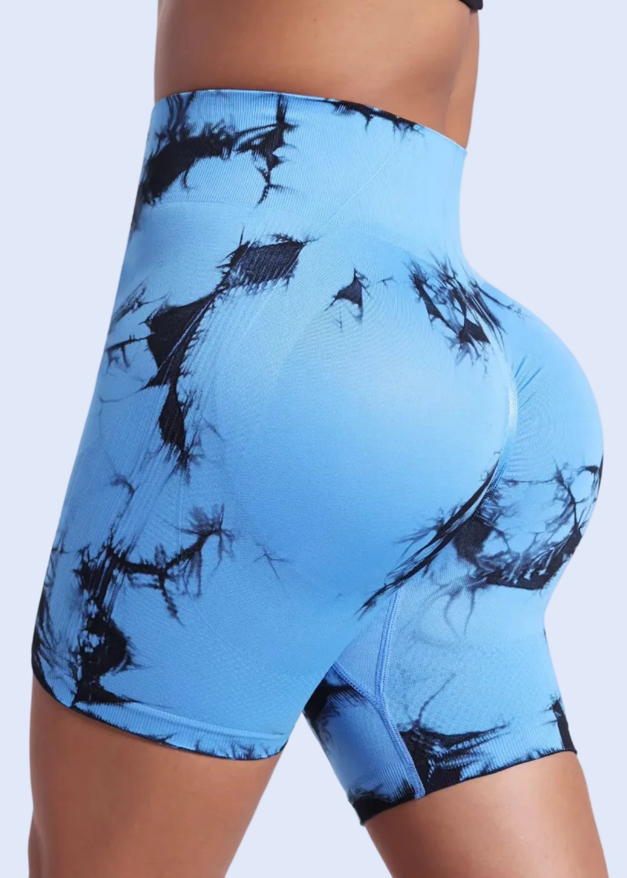 Blue and black tie-dye shorts on a white background