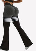 Black and gray leggings with striped socks on a white background