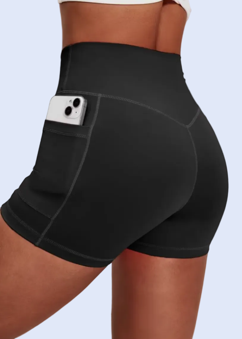 Black shorts with a pocket on a gray background