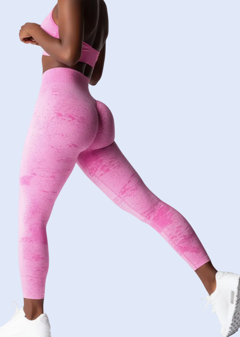 Person wearing pink athletic leggings on a white background with product details at the bottom.