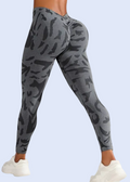 Gray camouflage leggings worn by a person on a light gray background
