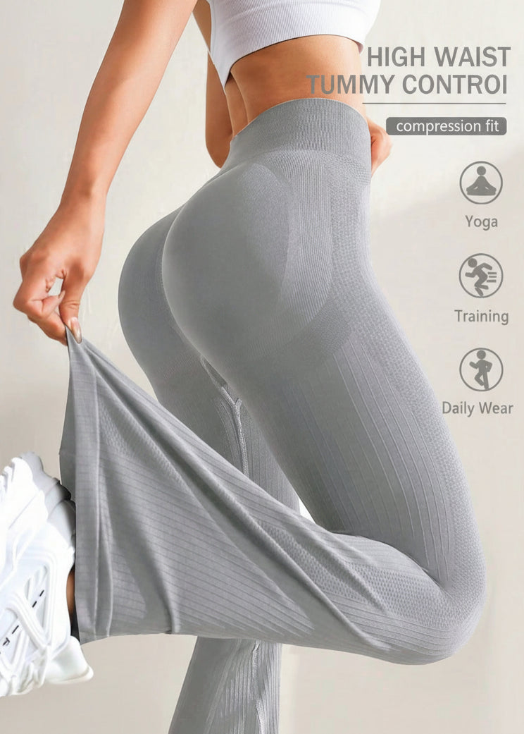 Gray high-waisted leggings being worn with text highlighting features on a light background