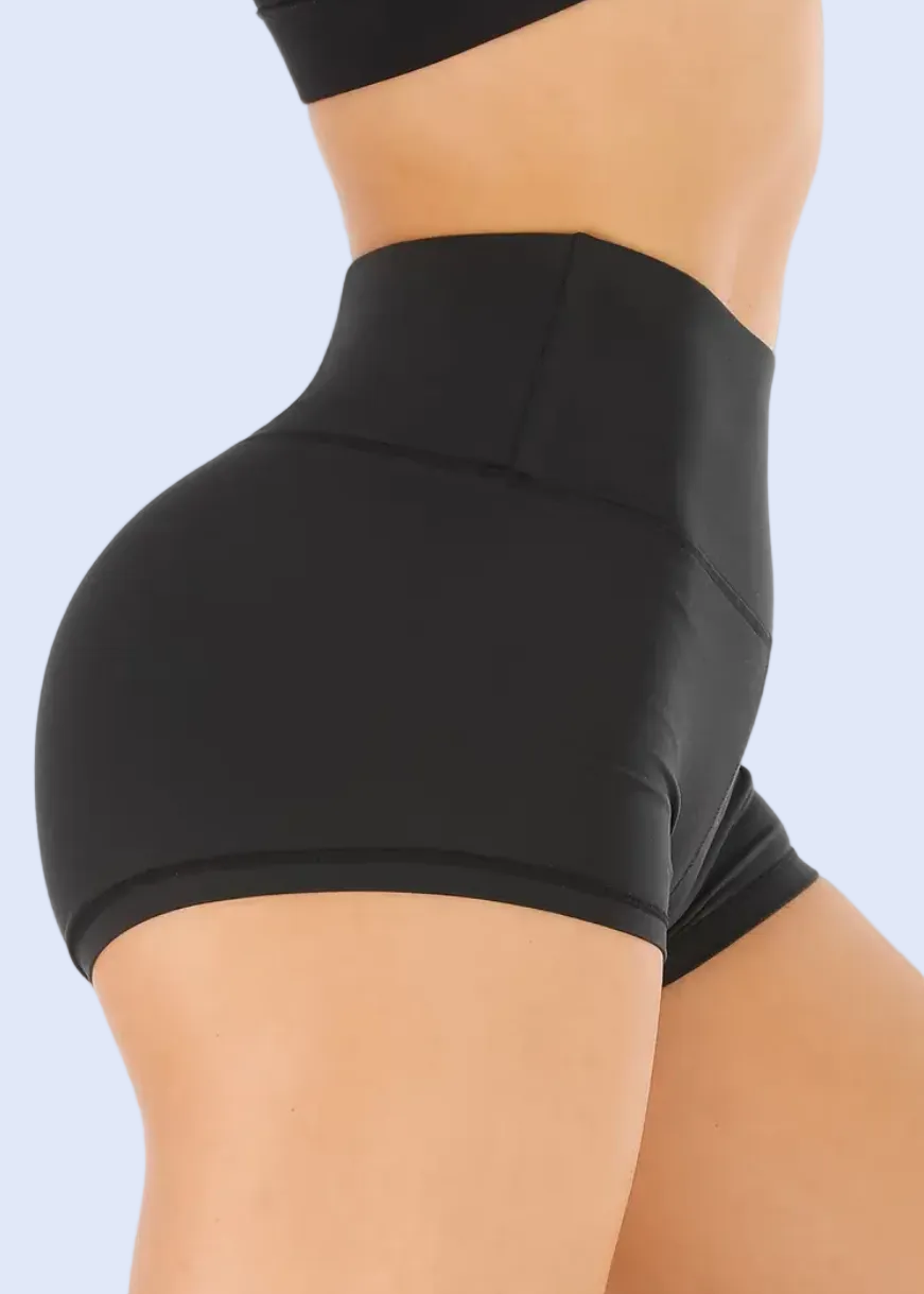 Black high-waisted shorts on a white background