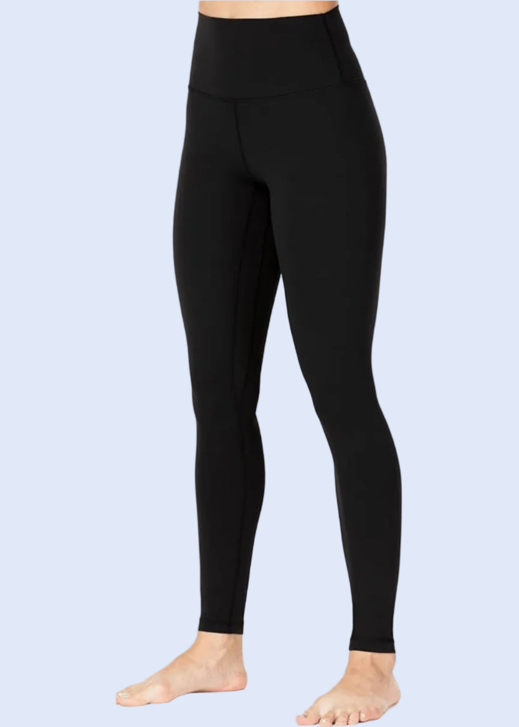 Black leggings worn by a person on a white background