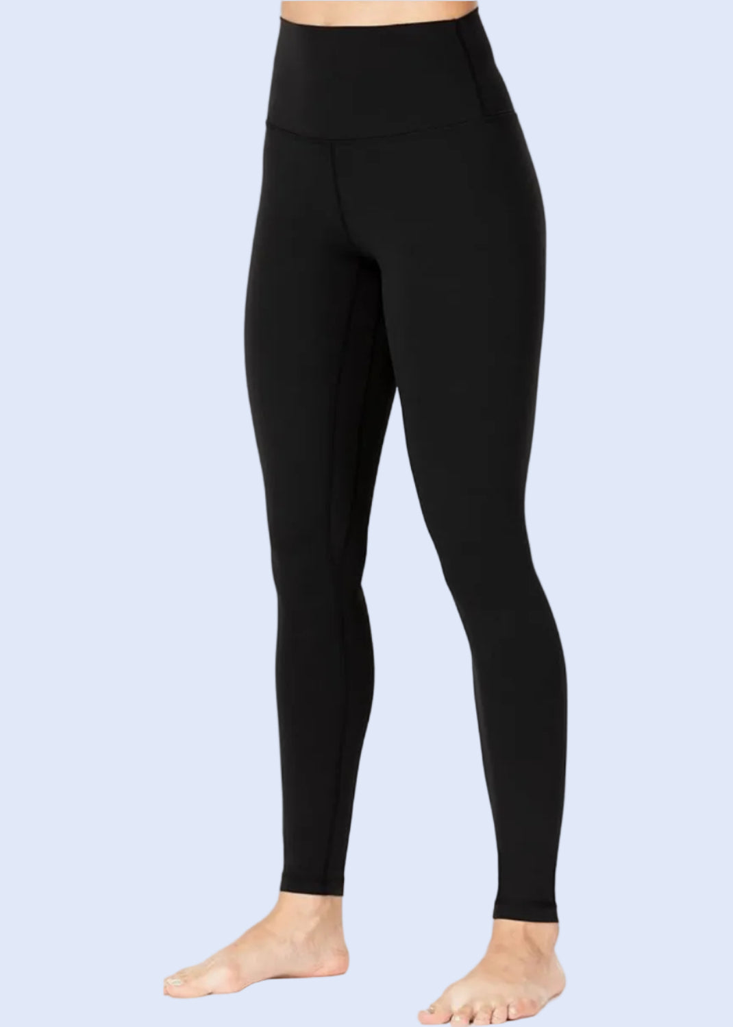 Black leggings worn by a person on a white background