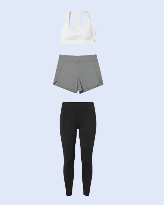 Woman wearing gray shorts on a product page with 'Add to cart' and 'Buy now' buttons.